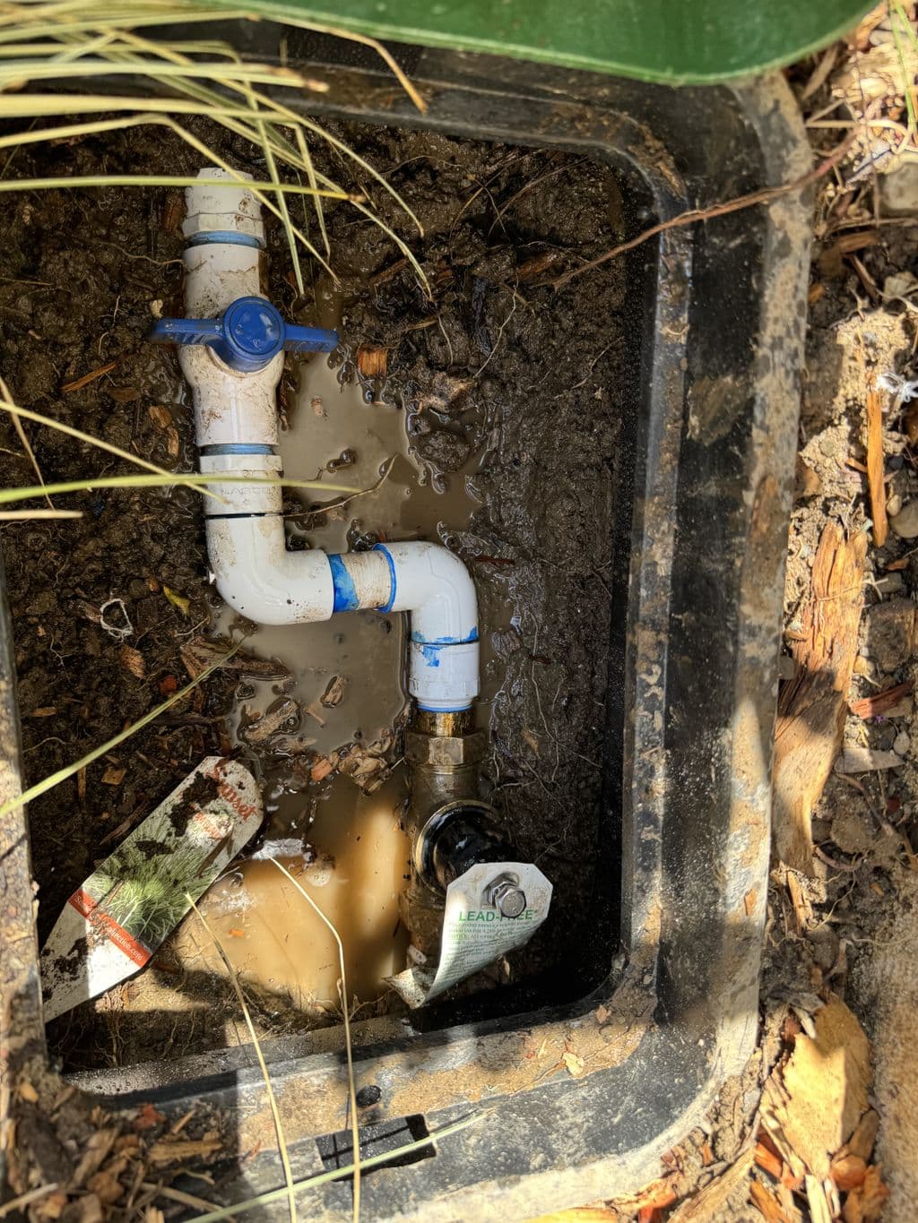 Irrigation valve box with PVC piping and brass shutoff. Work by Construction Hub in Los Angeles.